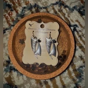 Uniquely shaped silver and black dangly earrings